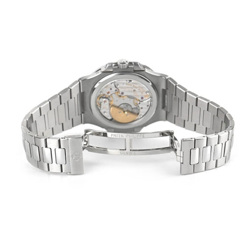 The sealed case back of the Nautilus watch, made of brushed stainless steel and secured with four screws, representing the water-resistant design that protects the intricate self-winding movement within.