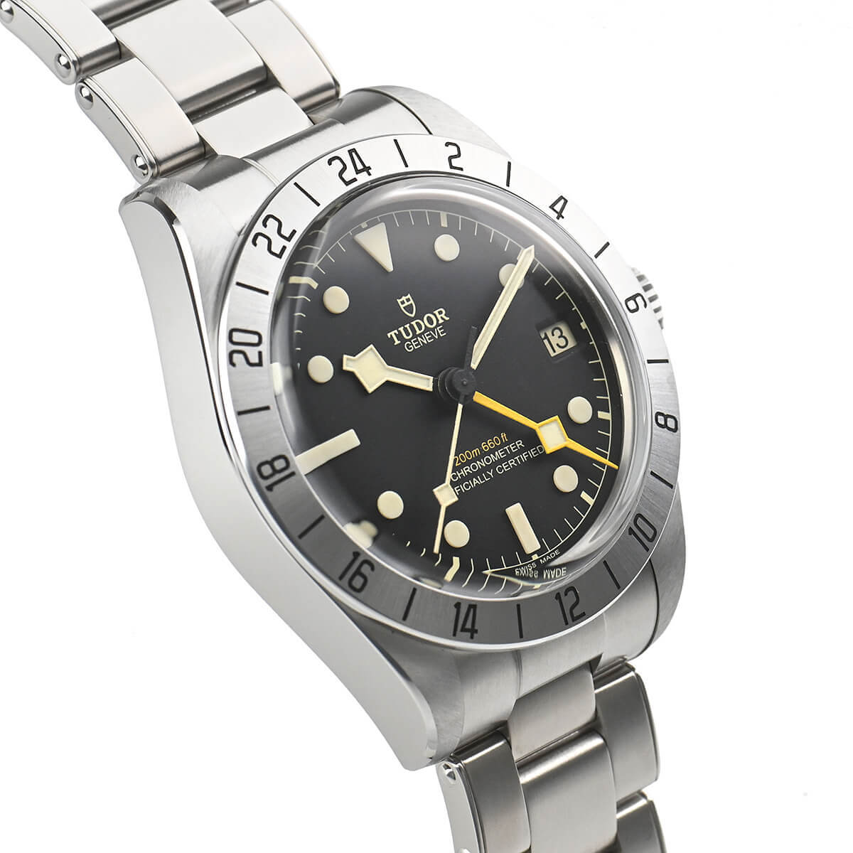 A profile view of the watch's left side, showing the satin-finished stainless steel case and the fluted crown, which features Tudor's iconic rose emblem engraved on its end.