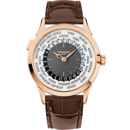 A close-up of the Patek Philippe 5230R-001's charcoal-gray dial, showcasing its hand-guilloché center, rose gold applied markers, and the concentric world time display with a city ring and 24-hour track.